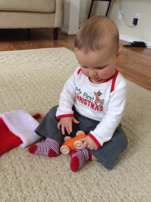 George getting his toy car out of his stocking